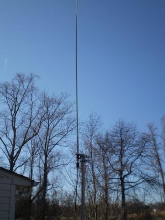 Home Brew Vertical with whip feedpoint about 5' off the ground on a PVC mast.